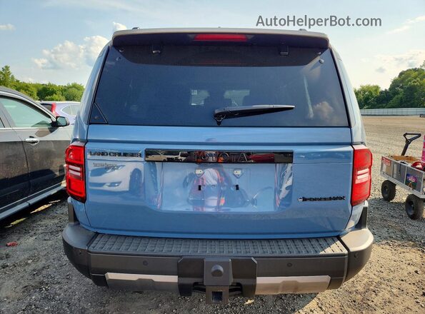 JTEABFAJ2TK056017 2026 TOYOTA LAND Blue უკანა ხედი
