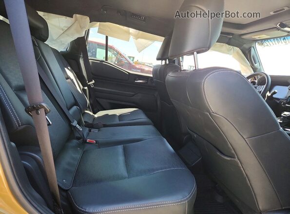 JTEABFAJ5RK010478 2024 TOYOTA LAND Tan Widok wnętrza z tyłu