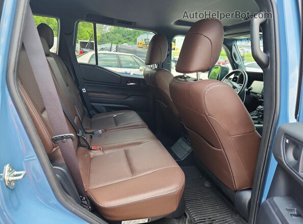 JTEABFAJ8RK006568 2024 TOYOTA LAND Blue Rear interior view