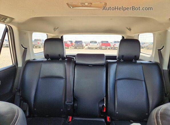 JTEBU5JR6J5558281 2018 TOYOTA 4RUNNER Silver Rear seats view