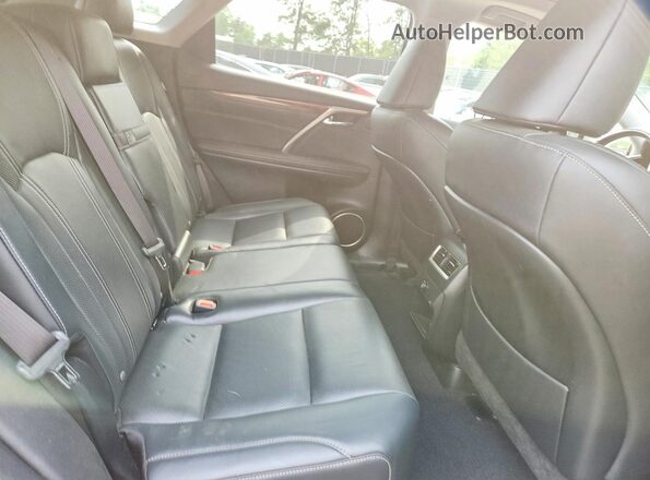 JTJBZMCA1G2002877 2016 LEXUS RX Silver უკანა სალონის ხედი