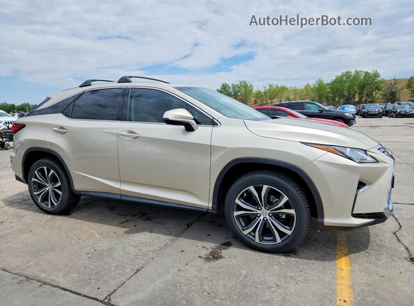 JTJBZMCA5G2012330 2016 LEXUS RX Золотой Передняя правая четверть