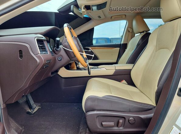 JTJBZMCA5G2012330 2016 LEXUS RX Золотой Вид салона спереди