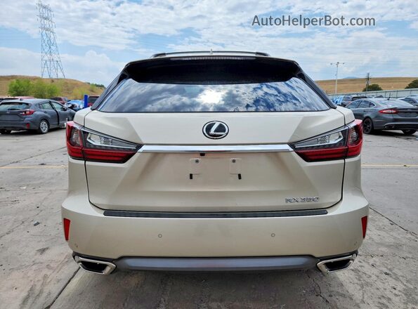 JTJBZMCA5G2012330 2016 LEXUS RX Золотой Вид сзади