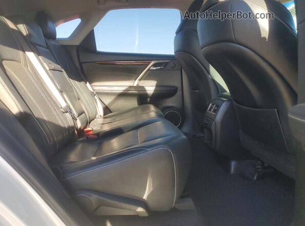 JTJBZMCA8H2015210 2017 LEXUS RX White Vista interior trasera