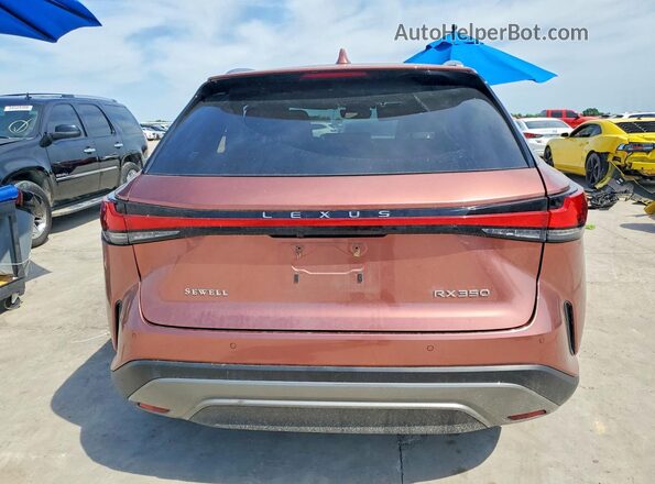JTJCHMAA2P2005619 2023 LEXUS RX Tan Rear view