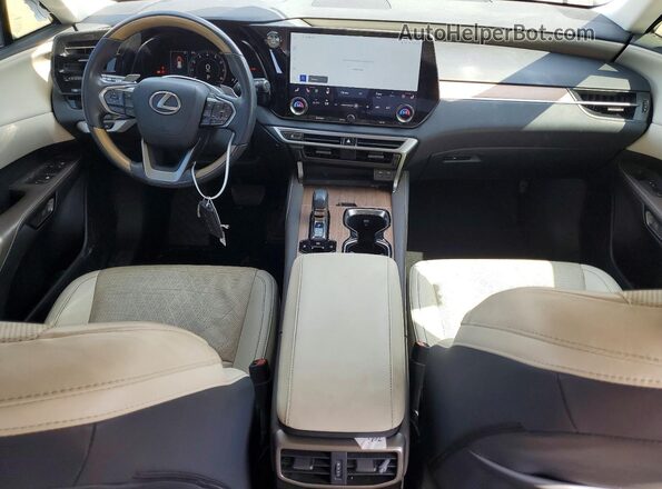 JTJCHMAA2P2005619 2023 LEXUS RX Tan Dashboard view