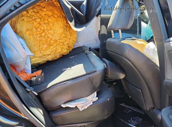 JTJCJMGA3S2025978 2025 LEXUS RX Black Vista interior trasera