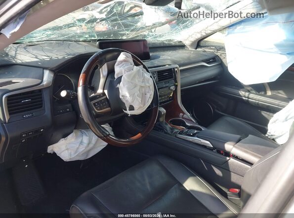 JTJDGKCA9K2006512 2019 LEXUS RX 450HL Gray Front interior view