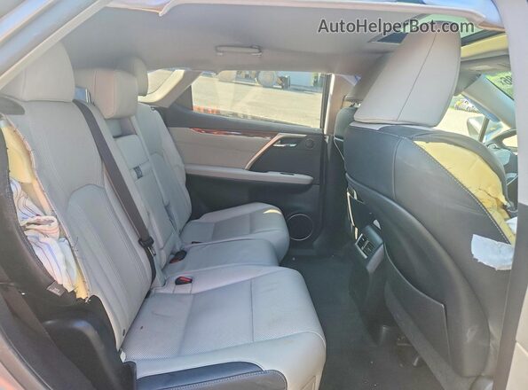 JTJDZKCAXK2016752 2019 LEXUS RX Silver Vista interior trasera