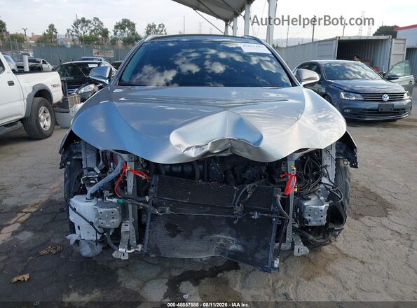 JTJHKCFZ0S2043598 2025 LEXUS NX 450H+ Серебряный Вид задней части салона