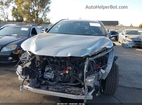 JTJKKCFZ2R2023479 2024 LEXUS NX 450H+ Gray უკანა სალონის ხედი