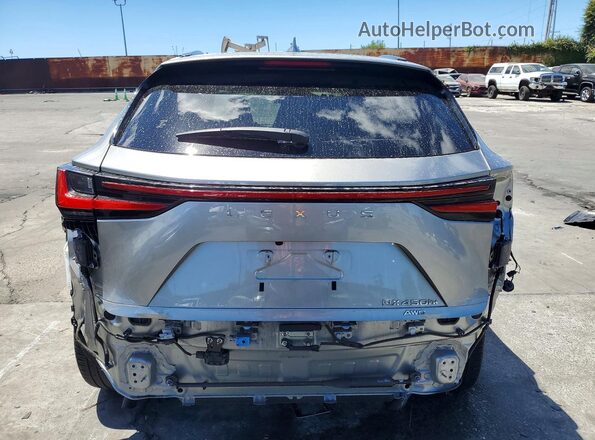 JTJKKCFZ4R2024052 2024 LEXUS NX Silver Вид ззаду