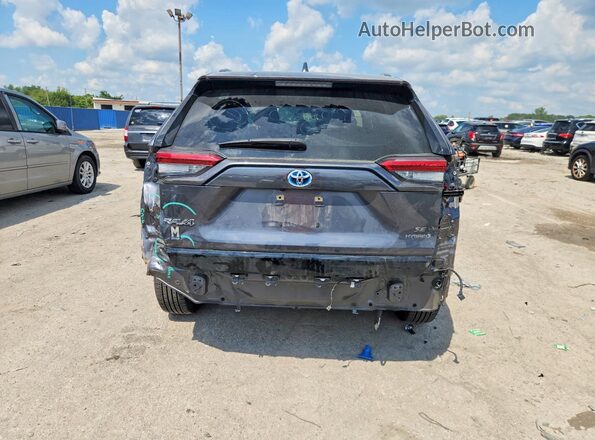 JTM16RFV0ND069409 2022 TOYOTA RAV4 Gray Vista trasera