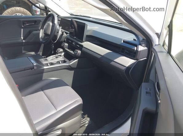 JTM6DRBVXTD320631 2026 TOYOTA RAV4 White Widok wnętrza z przodu