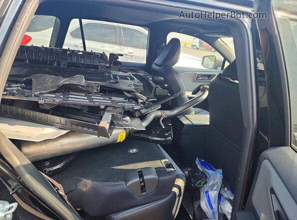 JTM7ERAV9TD001188 2026 TOYOTA RAV4 Black Widok tylnych siedzeń