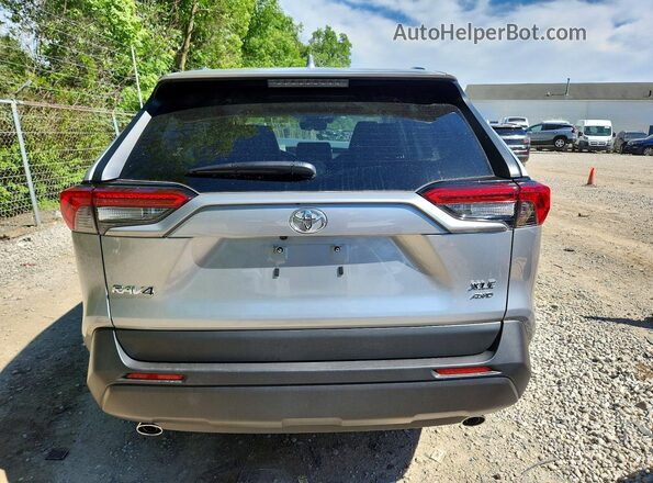 JTMA1RFV6SJ046261 2025 TOYOTA RAV4 Silver Rear view