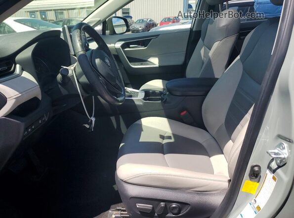 JTMA1RFV7KD517235 2019 TOYOTA RAV4 Gray Front interior view