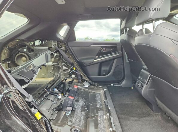 JTMABABA6PA021188 2023 SUBARU SOLTERRA Black Вид задньої частини салону