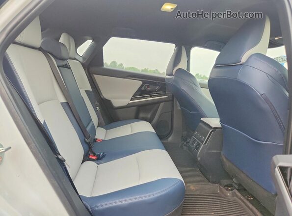 JTMABABA9RA056472 2024 SUBARU SOLTERRA White უკანა სალონის ხედი