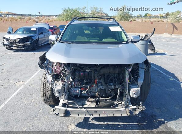 JTMB6RFV0RD146645 2024 TOYOTA RAV4 HYBRID Silver Rear interior view