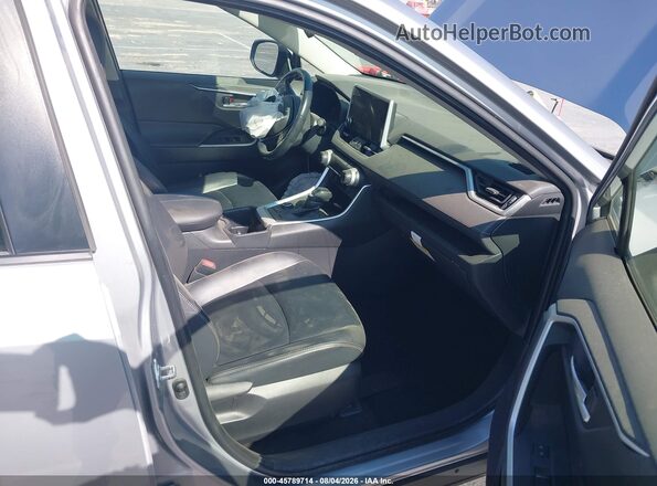 JTMB6RFV0RD146645 2024 TOYOTA RAV4 HYBRID Silver Front interior view