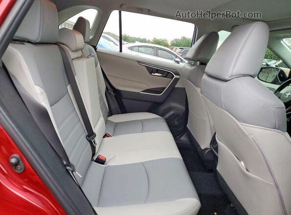 JTMB6RFV1MD039998 2021 TOYOTA RAV4 Red Vista interior trasera