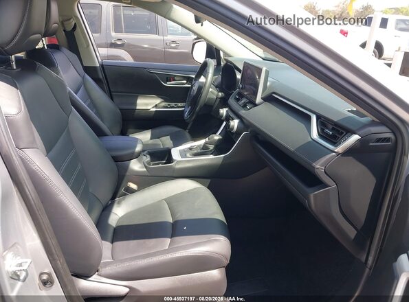 JTMB6RFV2PD089829 2023 TOYOTA RAV4 HYBRID Silver Widok wnętrza z przodu