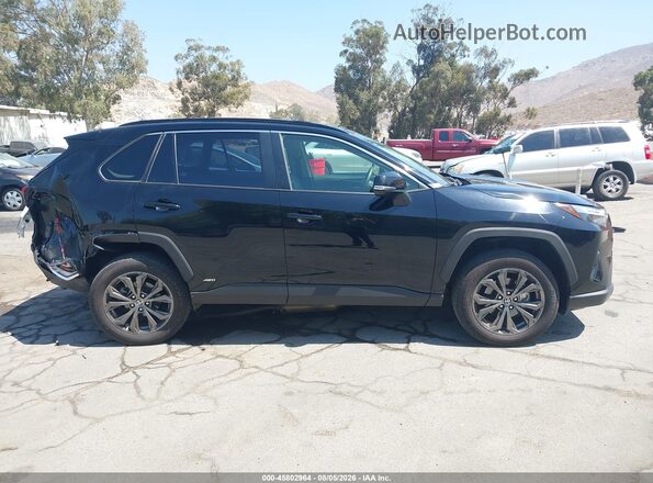 JTMB6RFV2SD152405 2025 TOYOTA RAV4 HYBRID Black Вид задньої частини салону