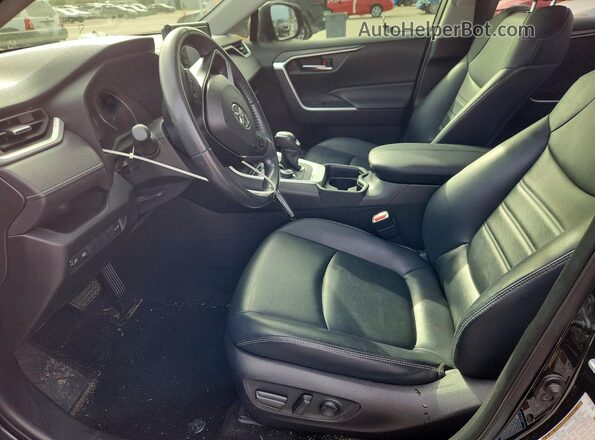 JTMB6RFV4MD007594 2021 TOYOTA RAV4 Black Front interior view