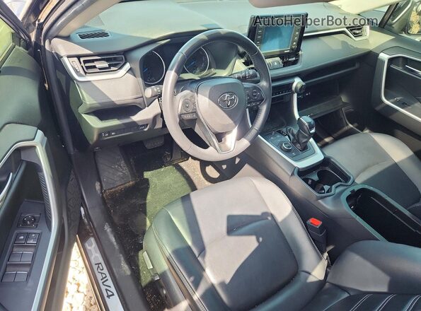 JTMB6RFV4MD007594 2021 TOYOTA RAV4 Black Dashboard view