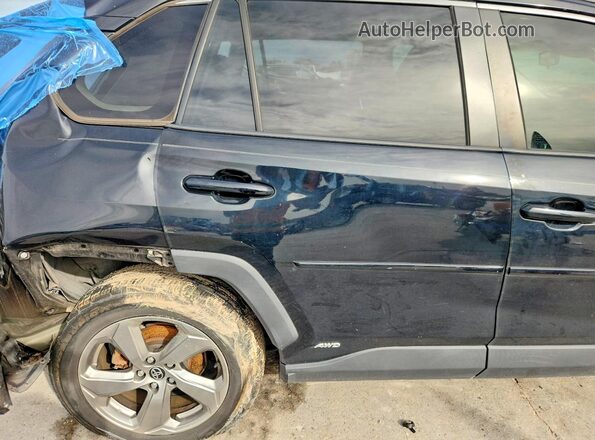 JTMB6RFV4MD007594 2021 TOYOTA RAV4 Black Rear interior view