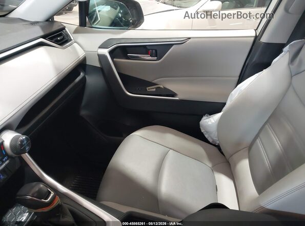 JTMB6RFV6ND078572 2022 TOYOTA RAV4 HYBRID Белый Вид салона спереди