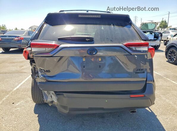 JTMB6RFV7RD137621 2024 TOYOTA RAV4 Gray Вид ззаду