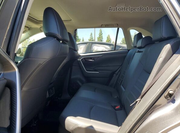 JTMB6RFV7RD137621 2024 TOYOTA RAV4 Gray Вид задньої частини салону