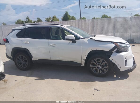 JTMB6RFV8ND076371 2022 TOYOTA RAV4 HYBRID White Սալոնի հետևի տեսք