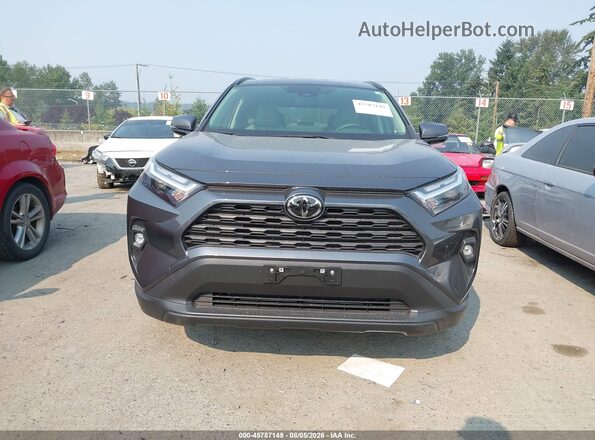 JTMB6RFV9SD155883 2025 TOYOTA RAV4 HYBRID Gray Rear interior view