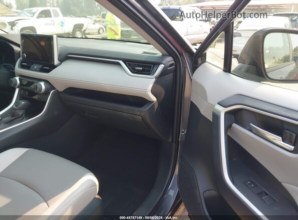JTMB6RFV9SD155883 2025 TOYOTA RAV4 HYBRID Gray Front interior view