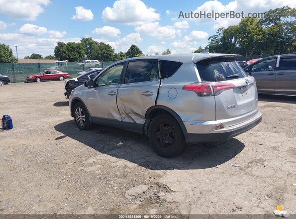 JTMBFREV0JJ198297 2018 TOYOTA RAV4 Silver უკანა მარცხენა