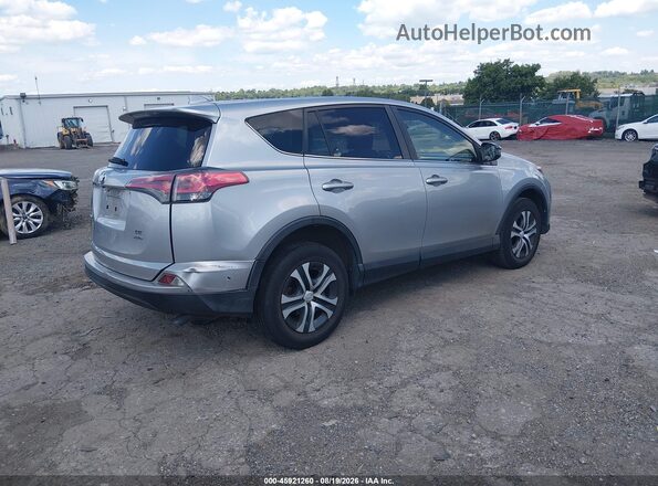 JTMBFREV0JJ198297 2018 TOYOTA RAV4 Silver უკანა მარჯვენა