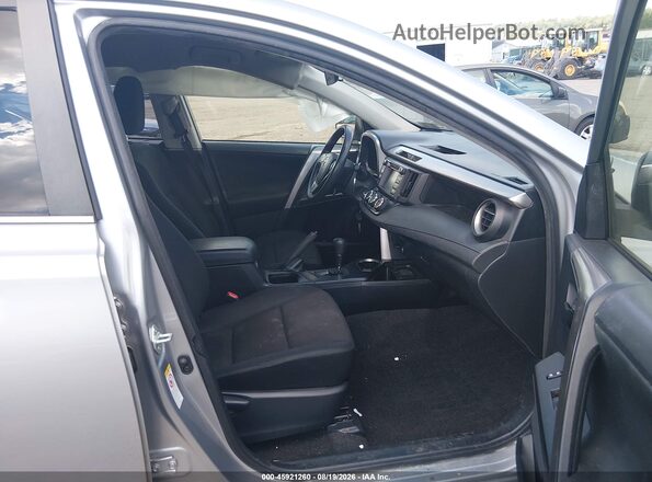 JTMBFREV0JJ198297 2018 TOYOTA RAV4 Silver წინა სალონის ხედი