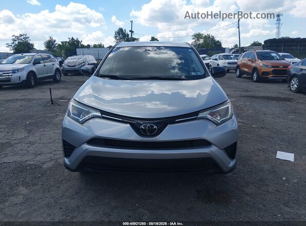 JTMBFREV0JJ198297 2018 TOYOTA RAV4 Silver ხელსაწყოთა პანელის ხედი