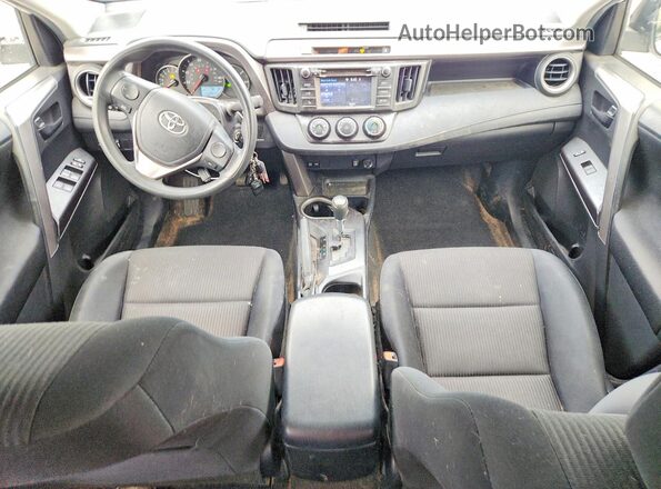 JTMBFREV1GJ070028 2016 TOYOTA RAV4 White Dashboard view
