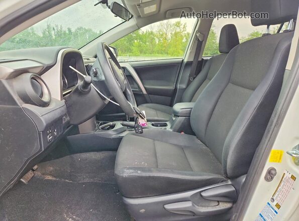 JTMBFREV1GJ070028 2016 TOYOTA RAV4 White Front interior view