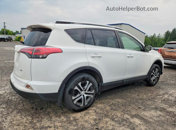 JTMBFREV1GJ070028 2016 TOYOTA RAV4 White Rear right