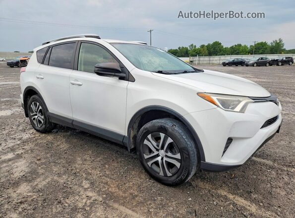 JTMBFREV1GJ070028 2016 TOYOTA RAV4 White Front right