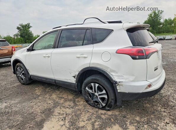 JTMBFREV1GJ070028 2016 TOYOTA RAV4 White Rear left
