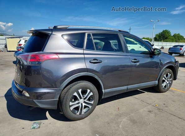 JTMBFREV1HJ124803 2017 TOYOTA RAV4 Gray Rear right