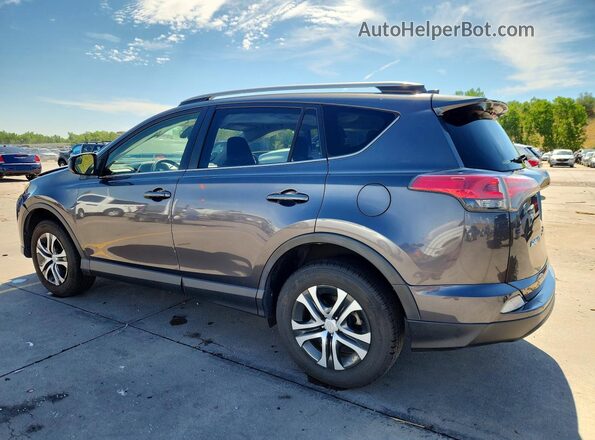 JTMBFREV1HJ124803 2017 TOYOTA RAV4 Gray Rear left