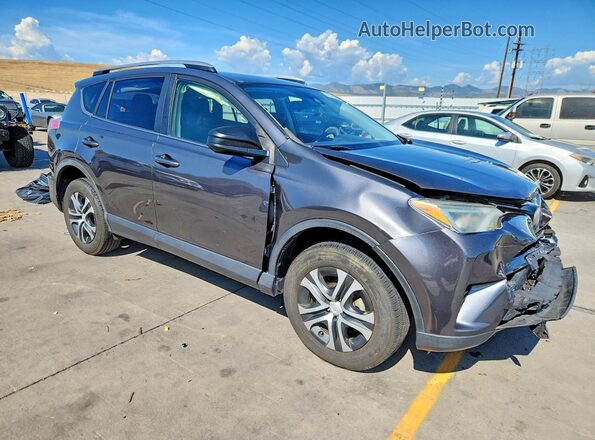JTMBFREV1HJ124803 2017 TOYOTA RAV4 Gray Front right